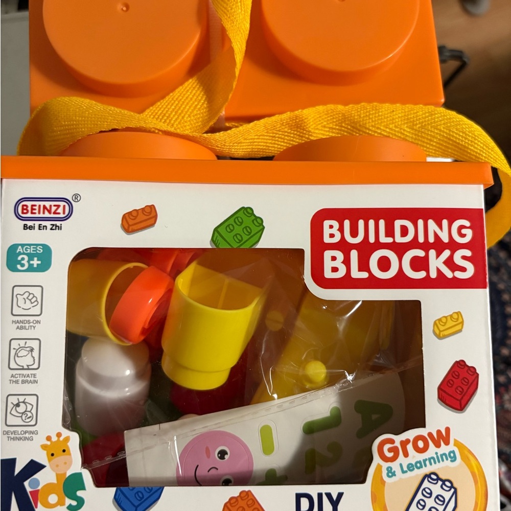 Vibrant Orange and Yellow Building Blocks Set for Creative Construction